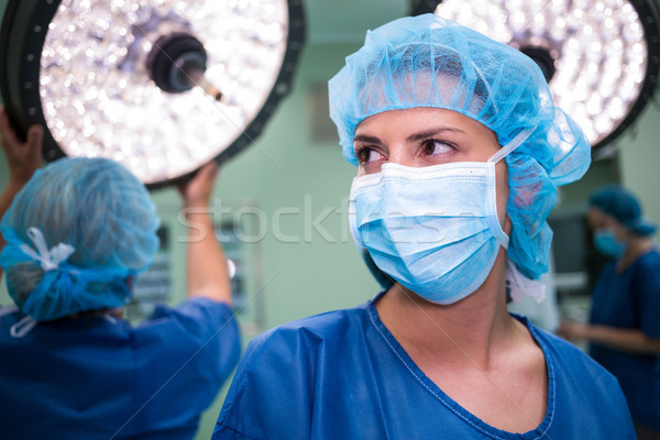 Surgeon standing in operation room Stock photo © wavebreak_media