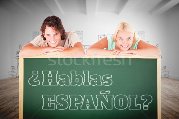 Composite image of smiling couple leaning on a whiteboard Stock photo © wavebreak_media