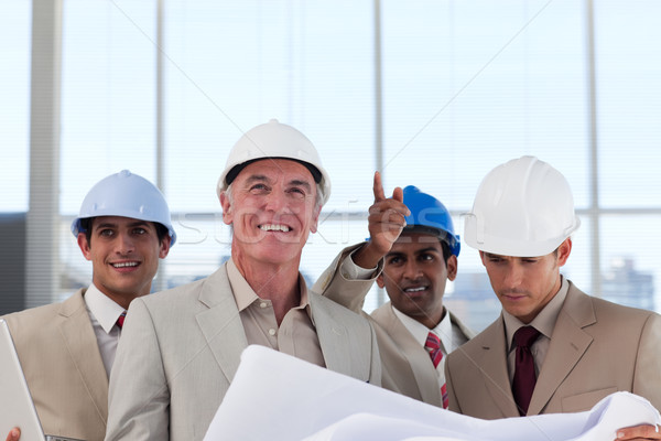 Groupe construction plan bâtiment affaires [[stock_photo]] © wavebreak_media