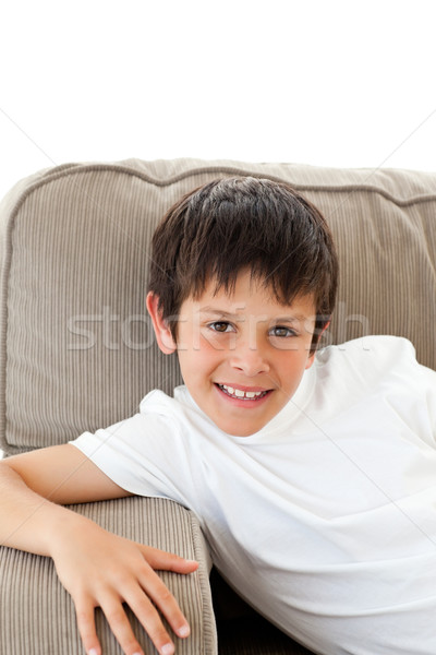 Portrait of a cute boy relaxing on the sofa at home Stock photo © wavebreak_media