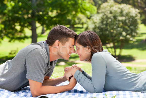 Enamored couple in the park  Stock photo © wavebreak_media