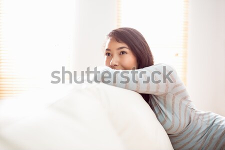 Mujer hermosa hasta dormitorio salud tiempo cama Foto stock © wavebreak_media