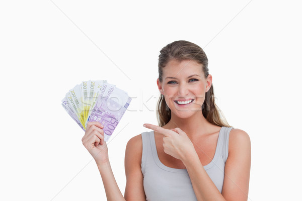 [[stock_photo]]: Femme · pointant · banque · note · blanche · jeunes