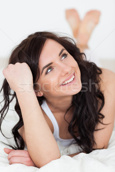 微笑的女人 思維 床 臥室 手 腿 商業照片 © wavebreak_media