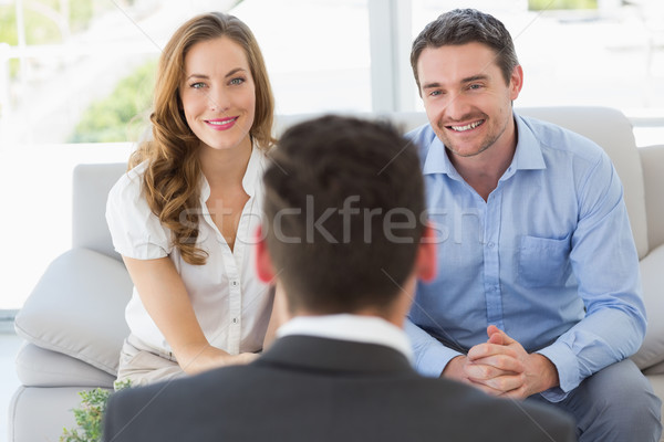 Souriant couple réunion financière conseiller [[stock_photo]] © wavebreak_media