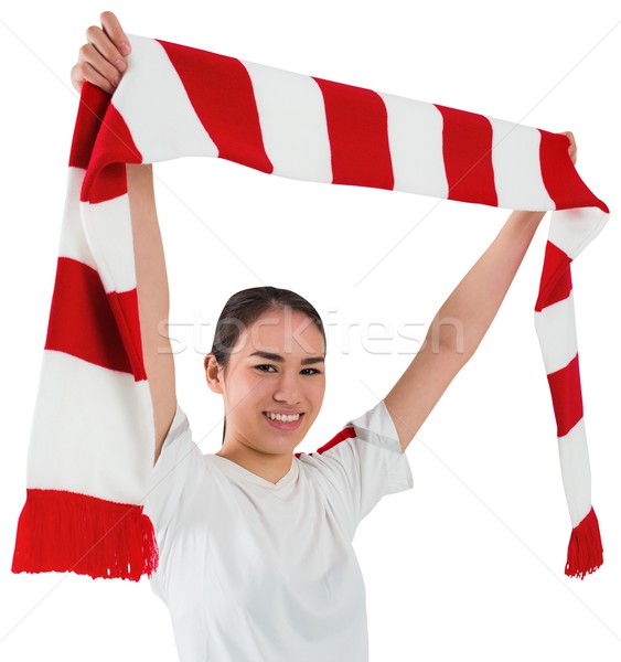 Football fan waving red and white scarf Stock photo © wavebreak_media