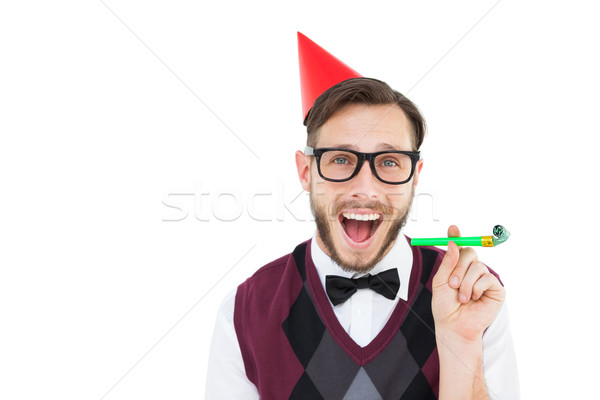 Geeky hipster in party hat with horn Stock photo © wavebreak_media