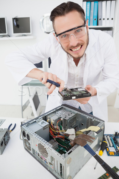 Weird computer engineer fixing broken cpu Stock photo © wavebreak_media