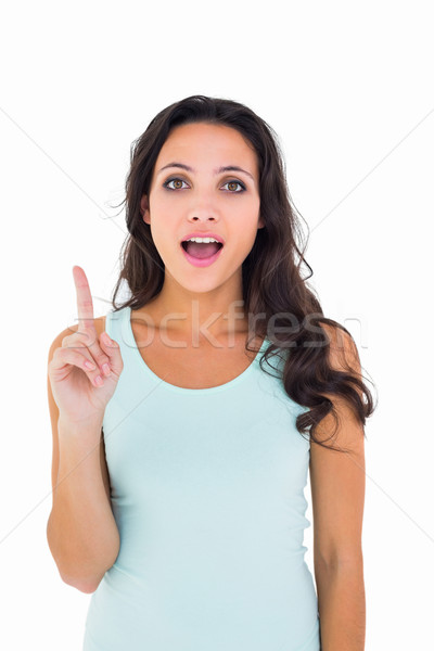 Pretty brunette getting an idea Stock photo © wavebreak_media