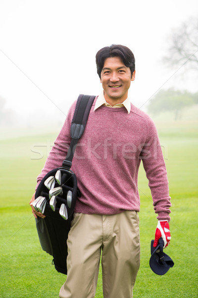 Golfista piedi sacca da golf sorridere fotocamera Foto d'archivio © wavebreak_media