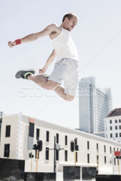 Man doing parkour in the city Stock photo © wavebreak_media