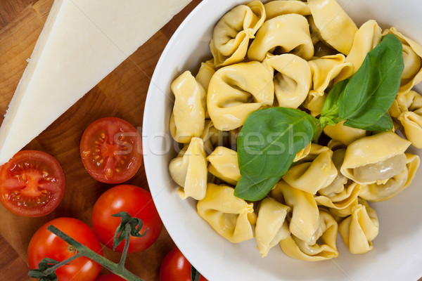 Pasta with herbs, cheese, tomatoes and napkin cloth Stock photo © wavebreak_media