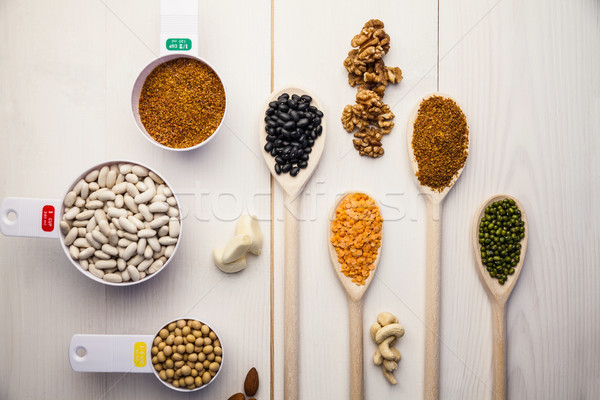 Spoons and cups of pulses and seeds Stock photo © wavebreak_media