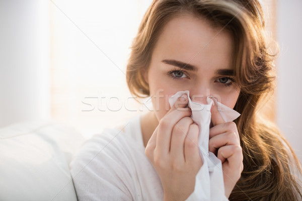 [[stock_photo]]: Femme · moucher · canapé · salon · maison · canapé