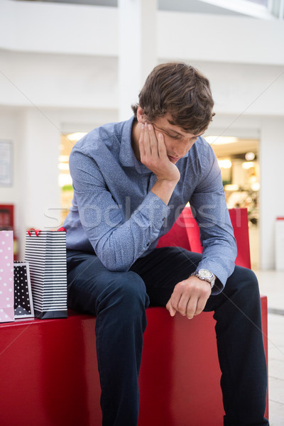 Fatigué homme séance main menton [[stock_photo]] © wavebreak_media