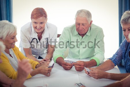 Doctor discussing reports with patient and his guardian Stock photo © wavebreak_media