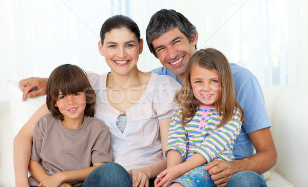 Portré boldog család ül kanapé otthon csoport Stock fotó © wavebreak_media