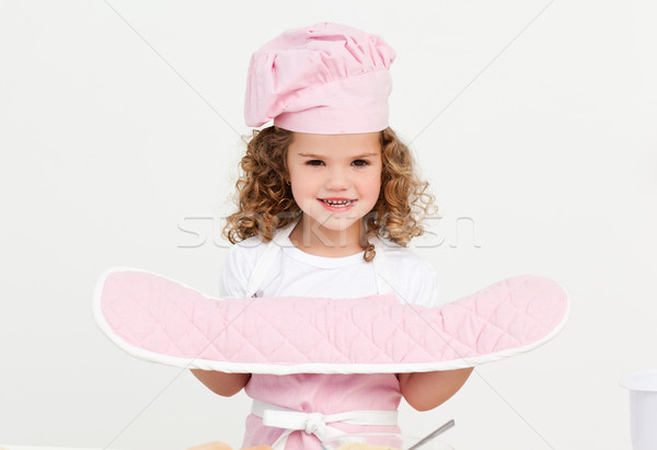 Fetita bucătărie mănuşi în picioare singur Imagine de stoc © wavebreak_media