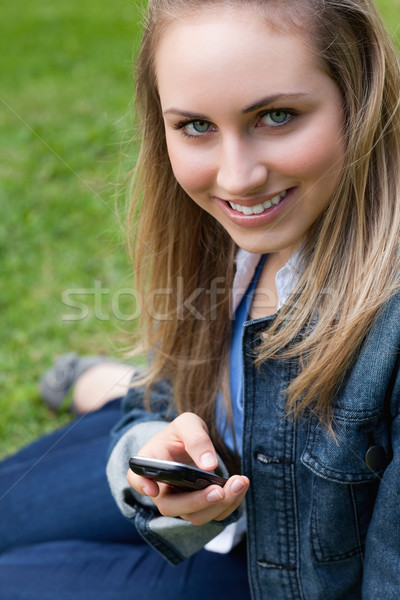 年輕 女孩 坐在 草 公園 商業照片 © wavebreak_media