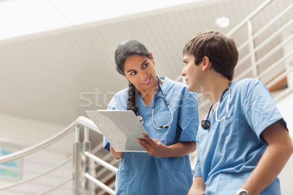 Nővér tart vágólap lépcsősor kórház nő Stock fotó © wavebreak_media