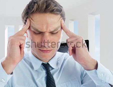 Businessman with severe headache at office Stock photo © wavebreak_media