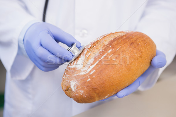 Scientist listening to bread  Stock photo © wavebreak_media