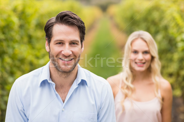 Jungen glücklich Paar lächelnd Kamera Trauben Stock foto © wavebreak_media