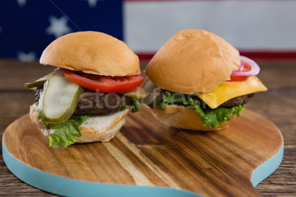 Burgers on wooden table with 4th july theme Stock photo © wavebreak_media