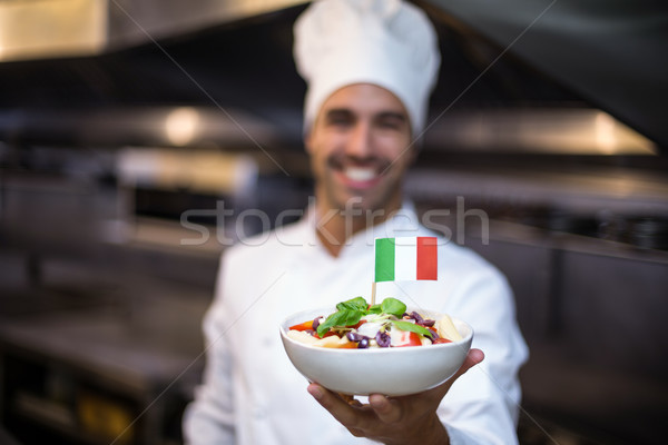 Bonito chef refeição bandeira italiana comercial Foto stock © wavebreak_media