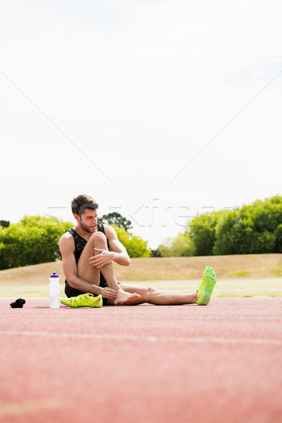 Fáradt atléta ül fut útvonal napos idő Stock fotó © wavebreak_media