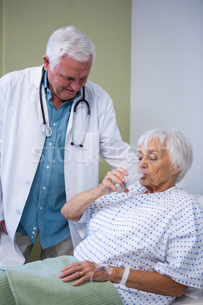Senior patient drinking a glass of water Stock photo © wavebreak_media