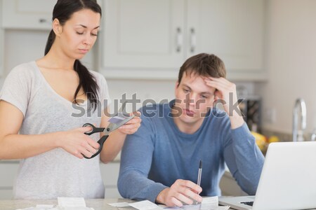 Young man looking after his wife with the flu  Stock photo © wavebreak_media