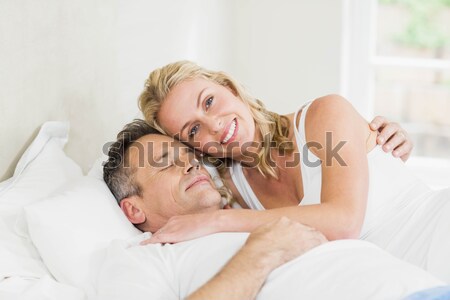 Couple under a duvet in a bed Stock photo © wavebreak_media