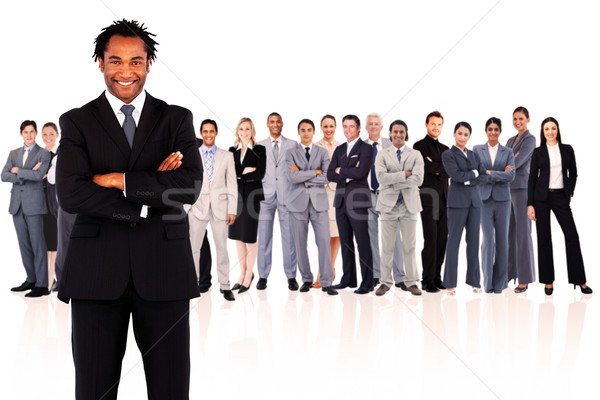 Foto stock: Empresário · em · pé · sorridente · branco · pessoas · de · negócios · equipe