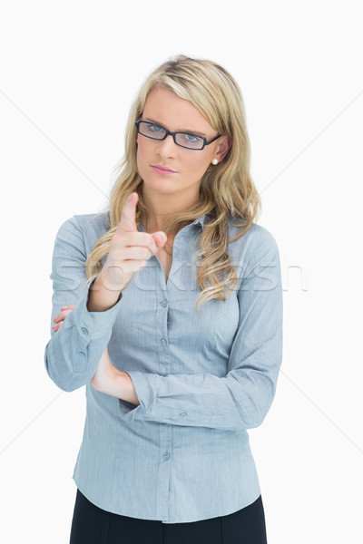 Strict blonde woman pointing  Stock photo © wavebreak_media