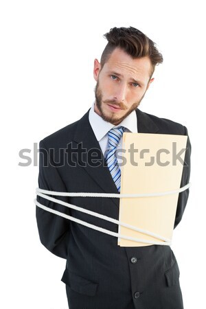 Serious businessman tied up at work Stock photo © wavebreak_media