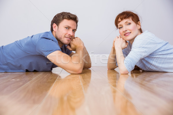 Paar vloer nieuw huis man gelukkig woonkamer Stockfoto © wavebreak_media