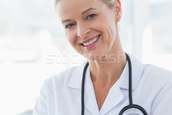 Close-up view of happy doctor looking at camera  Stock photo © wavebreak_media