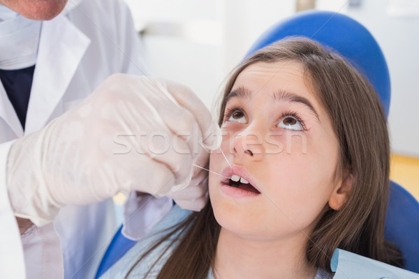 牙科醫生 牙縫拉線 年輕 病人 牙科 診所 商業照片 © wavebreak_media