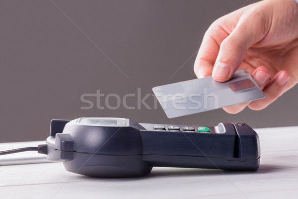 Man using card to express pay  Stock photo © wavebreak_media