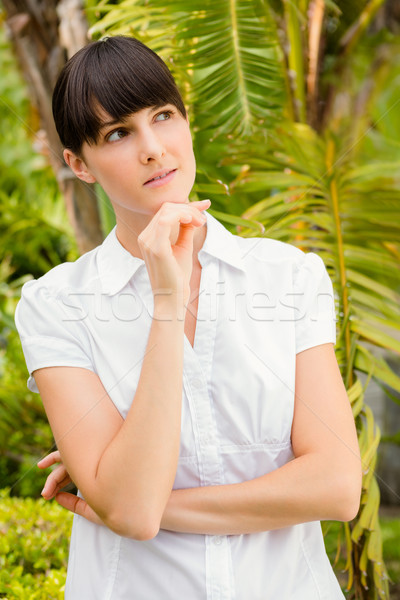 Pretty woman thoughtful looking away before spa day Stock photo © wavebreak_media