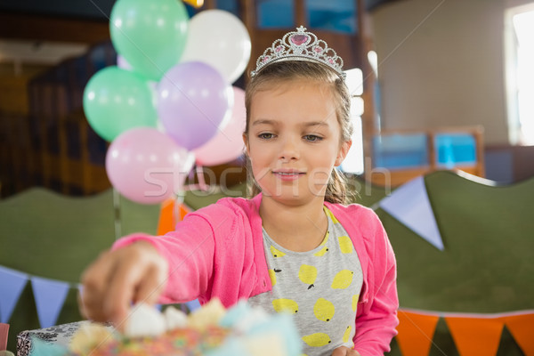 Birthday girl eating cake Stock photo © wavebreak_media