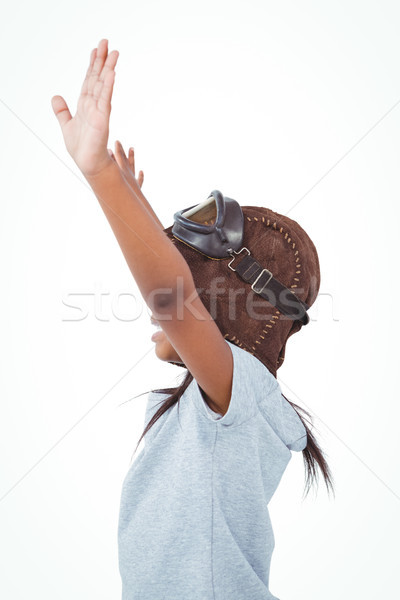 Side view of girl with outstretched arms pretending to be pilot Stock photo © wavebreak_media