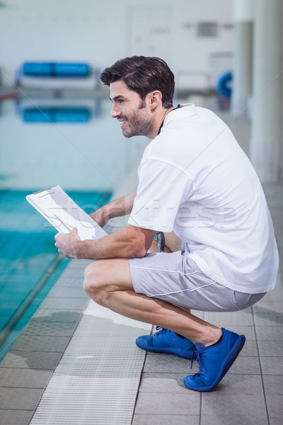 Ausbilder halten Zwischenablage Pool Wasser Mann Stock foto © wavebreak_media