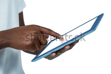 Hands using digital tablet against white background Stock photo © wavebreak_media