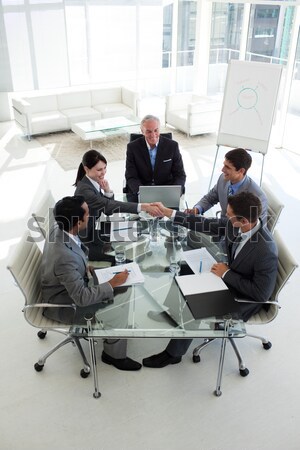 Gens d'affaires regarder document réunion affaires [[stock_photo]] © wavebreak_media