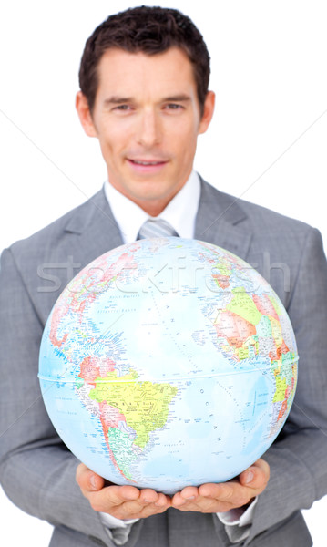 Assertive businessman holding a terrestrial globe  Stock photo © wavebreak_media