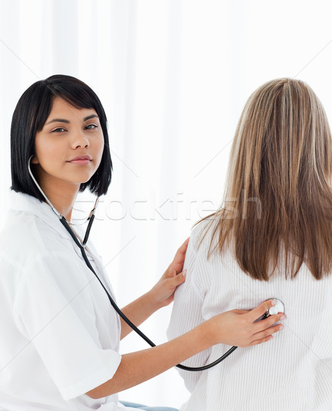 Woman with her nurse at home Stock photo © wavebreak_media
