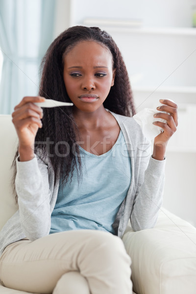 Ill young woman on couch Stock photo © wavebreak_media