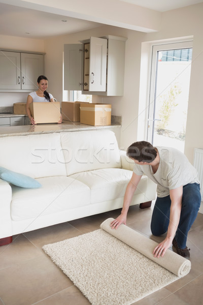 Two young people furnishing the kitchen and living room for a relocation Stock photo © wavebreak_media